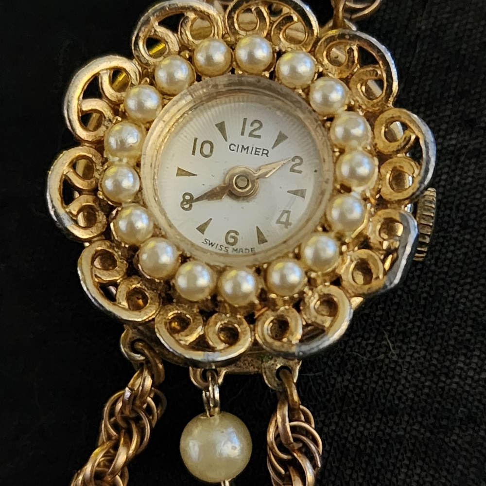 18k gold and small south sea pearl Cimier watch.